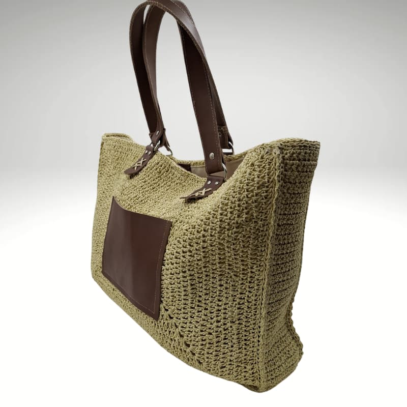 حقيبة كتف صيفية من القش من NVisters مع تفاصيل من الجلد الأصلي