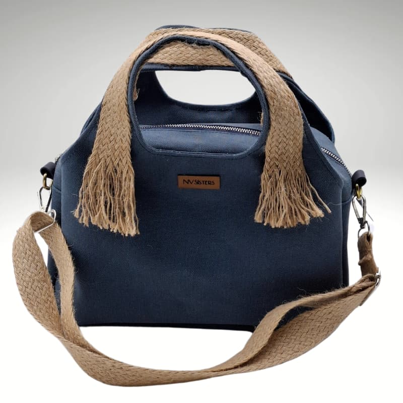 حقيبة يد وحقيبة كتف من القماش المشمع باللون الأزرق من NVisters