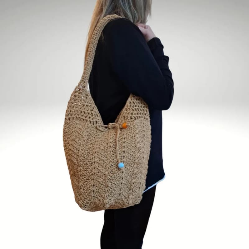 حقيبة قش نسائية مصنوعة يدوياً – حقيبة كتف صيفية 