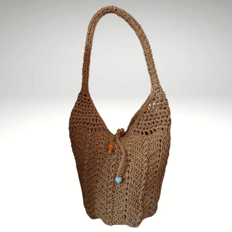حقيبة قش نسائية مصنوعة يدوياً – حقيبة كتف صيفية 