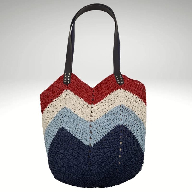 حقيبة NVsisters المصنوعة يدويًا من القش بنمط متعرج