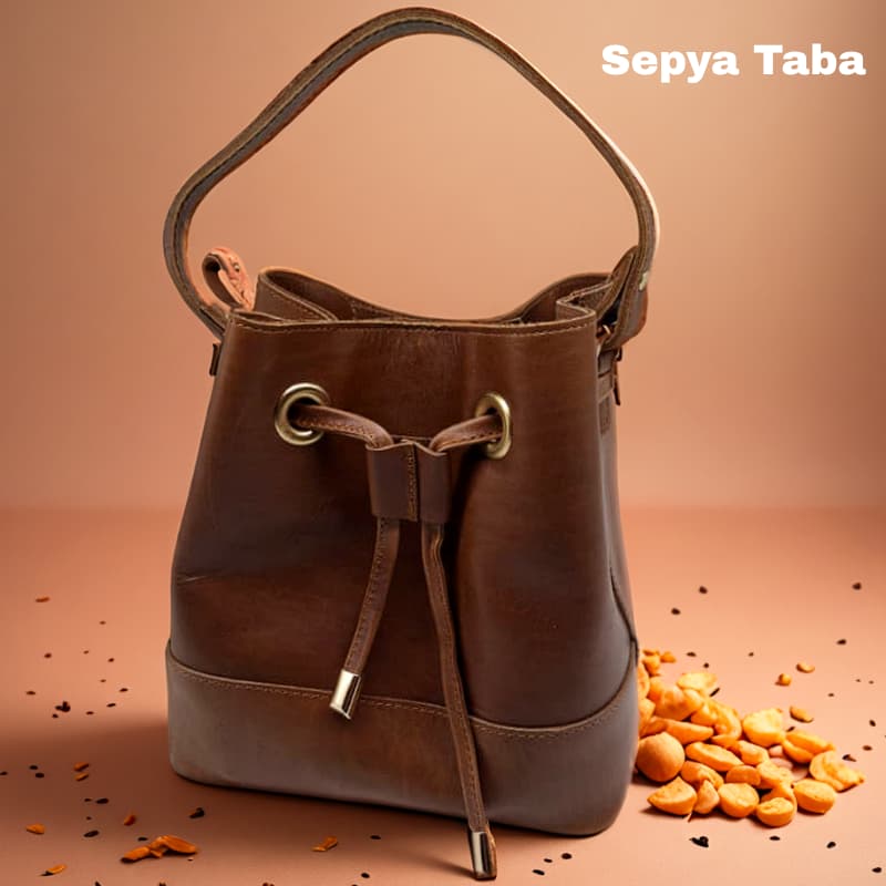 حقيبة NVisters المصنوعة يدويًا من جلد سيبيا الأصلي باللون البني