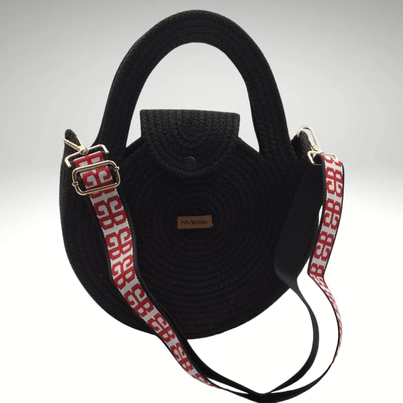 حقيبة يد وكتف صيفية دائرية سوداء من NVisters مع حزام منسوج أحمر