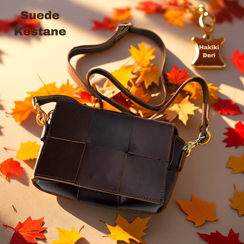 حقيبة NVsisters المصنوعة يدويًا من جلد الغزال الأصلي باللون البني الداكن